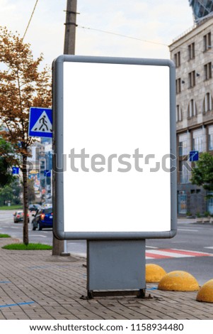 Mock up of light box on the street of metropolitan city for your advertising. Blank billboard with copy space