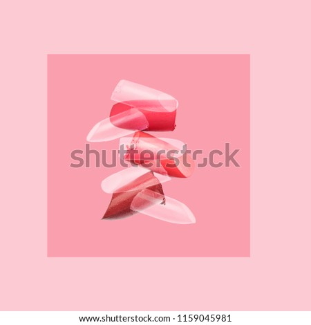 lipstick collection on pink background