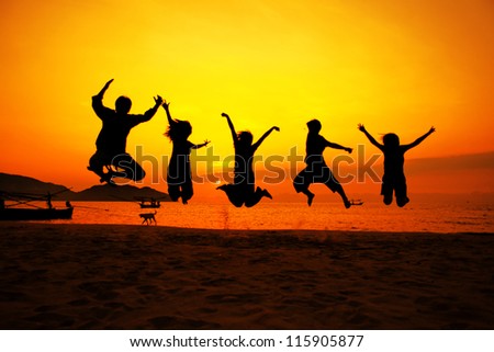Jumping team on the beach