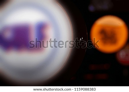 Blurred logo circle light board in dark 