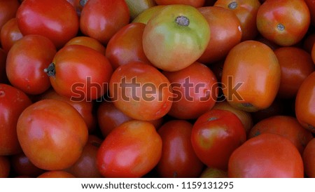 Tomatoes are a vegetable gardening stocked in the market,background.