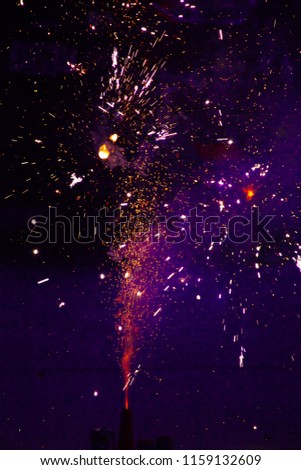 purple fireworks in sky