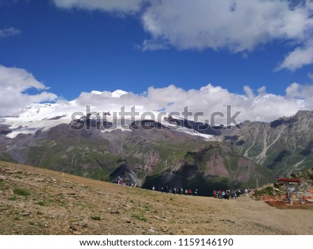 Beautiful panorama of the mountains of the Caucasus. Mount Elbrus 5642m, Mount Cheget, Russia, Caucasian mountain range, Elbrus region

