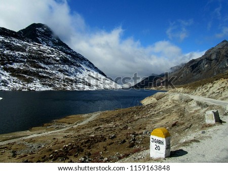 Sela Pass (more appropriately called Se La, as La means Pass) is a high-altitude mountain pass located on the border between the Tawang and West Kameng Districts of Arunachal Pradesh state in India. I Royalty-Free Stock Photo #1159163848