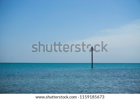 Empty sign on the sea