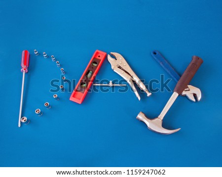 Top view variety handy tools on blue wooden background with copy space for text,Labor day concept