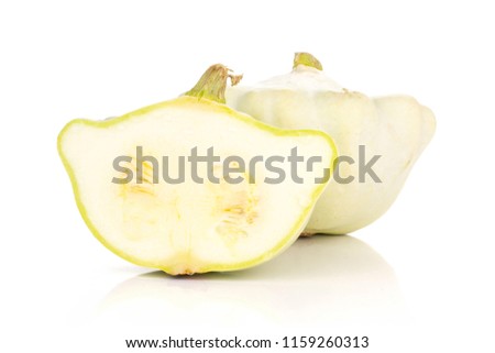 Group of one whole one half of summer white pattypan squash isolated on white background