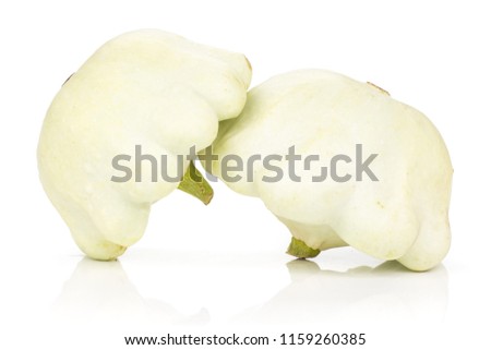 Group of two whole summer white pattypan squash isolated on white background