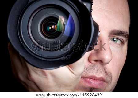 Photographer taking pictures with digital camera