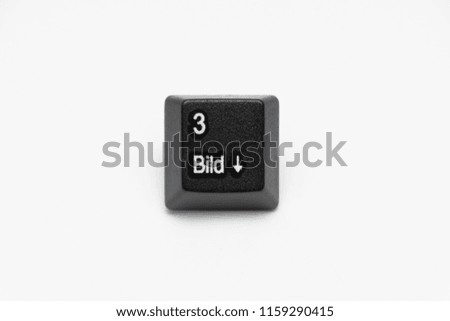 Single black keys of keyboard with different letters