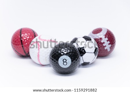 Golfball painted like a ball of many different sports golf balls