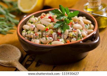 White bean cannellini salad. Royalty-Free Stock Photo #115930627
