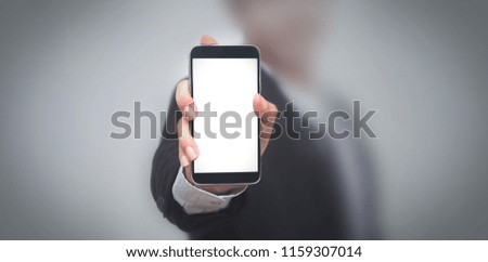 Businessman hand holding black phone isolated on white clipping path inside