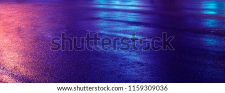 Background of wet asphalt with neon light. Blurred background, night lights, reflection. Royalty-Free Stock Photo #1159309036