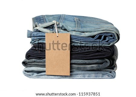 Stack Of Blue Jeans With Blank Tag