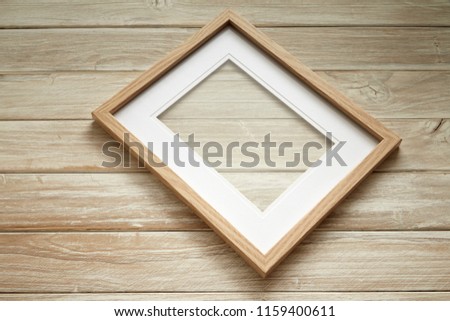 Wooden frame graphic stand product, interior design or montage display your product with blank texture blackboard for background. education concept.