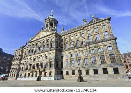 Royal Palace at the Dam Square, Amsterdam. It was built as city hall during the Dutch Golden Age in the seventeenth century. Royalty-Free Stock Photo #115940134