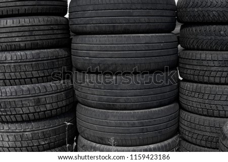 Protector of automobile tires. A number of automobile tires. Close up view on auto mobile new wheel tire surface. Different pattern and type tires for car industry commercial transport transpotration.
