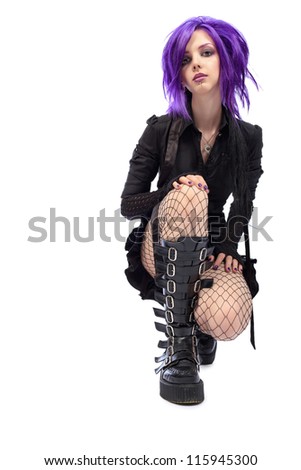 Portrait of a punk girl. Isolated over white background.