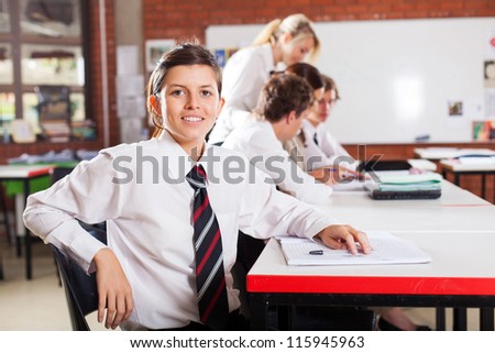 cute female high school student in classroom