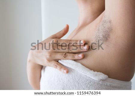 Armpit and armpit hair of Asian women on white background
