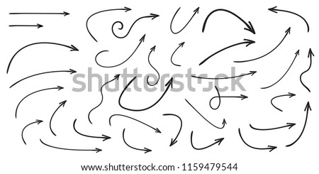 Set of vector curved arrows hand drawn. Sketch doodle style. Collection of pointers. Royalty-Free Stock Photo #1159479544