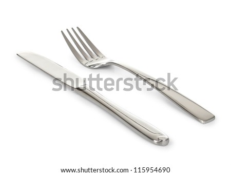 Knife and fork isolated on white background Royalty-Free Stock Photo #115954690