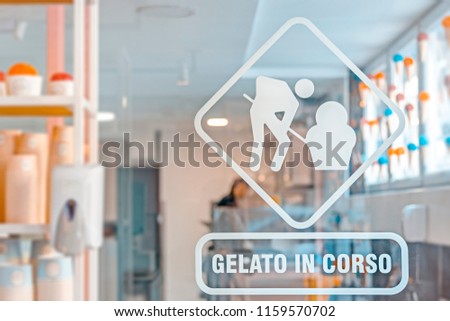 Gelato ice cream in ice cream shop on glass door
