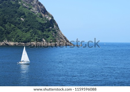 Maritime landscape with mountains.