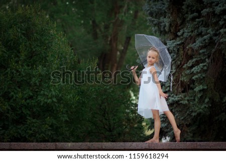  girl in the white dress of umbrella