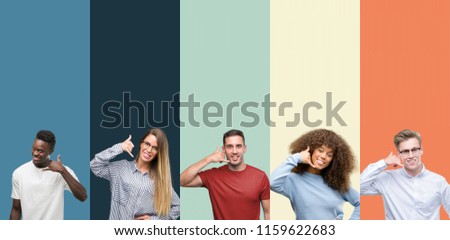 Group of people over vintage colors background smiling doing phone gesture with hand and fingers like talking on the telephone. Communicating concepts.