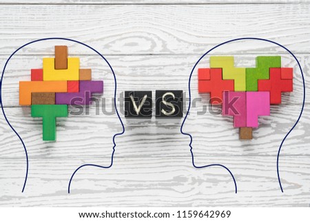 Heart vs Mind. Heart versus brain. Concept of mind against love. Heads of two people with colourful shapes of abstract brain and heart.