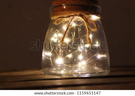 Light garland in a jar