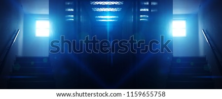 background of an empty open lift door, staircase, neon light