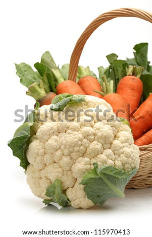 Fresh carrot and cauliflower on a white background