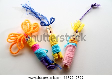 Worry doll as background / Worry dolls are small, mostly hand made dolls that originate from Guatemala and are also found in Mexico