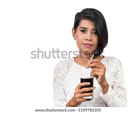 Beautiful asian woman holding glass of cola,  isolated on white background