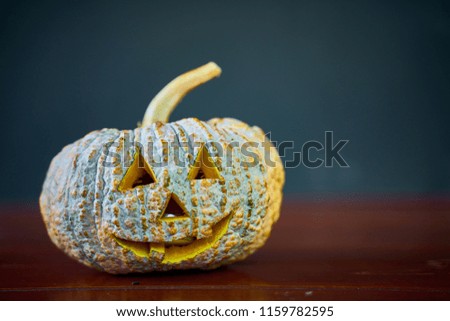 Halloween festival, pumpkin on wooden floor with black background