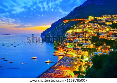 View of Positano village along Amalfi Coast in Italy at dusk. Royalty-Free Stock Photo #1159785007