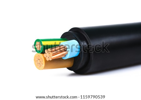 Electrical power cable on white background. Copper wire is the electric conductor of urban society. Royalty-Free Stock Photo #1159790539