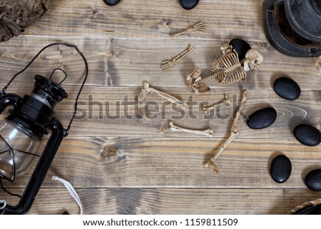 Halloween holiday background with skull and skeleton,View from above