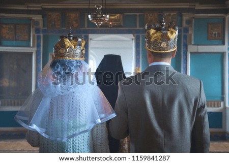 wedding of a young woman and a man in the Church