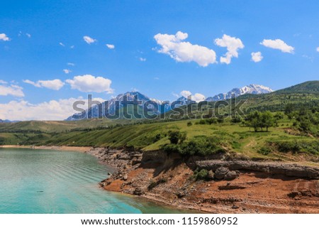 Amazing View to the Chimgan Lake, Uzbekistan Royalty-Free Stock Photo #1159860952