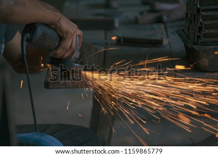 Sparks caused by polishing with a grinder.