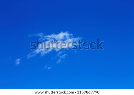 Idyllic white cloud on blue sky. Cloudscape background with fluffy cloud on blue summer sky wallpaper texture