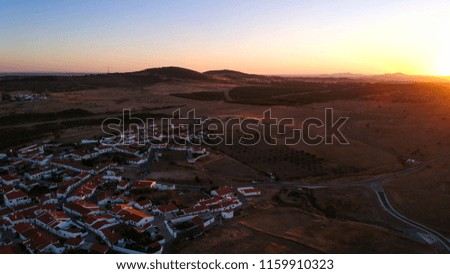 Aerial view of a landsacape with village in Alentejo at the sunset. Portugal. Drone photo