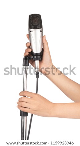 hand holding condenser microphone microphone on stand isolated on white background