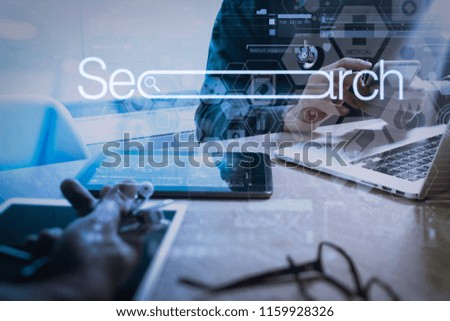 Searching Browsing Internet Data Information Networking Concept with blank search bar.medical doctor hand working with smart phone,digital tablet computer,stethoscope eyeglass on wooden desk.