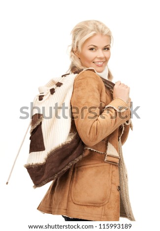 picture of woman in sheepskin jacket with backpack