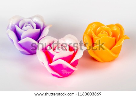 decorative soap as a rose lies on a table